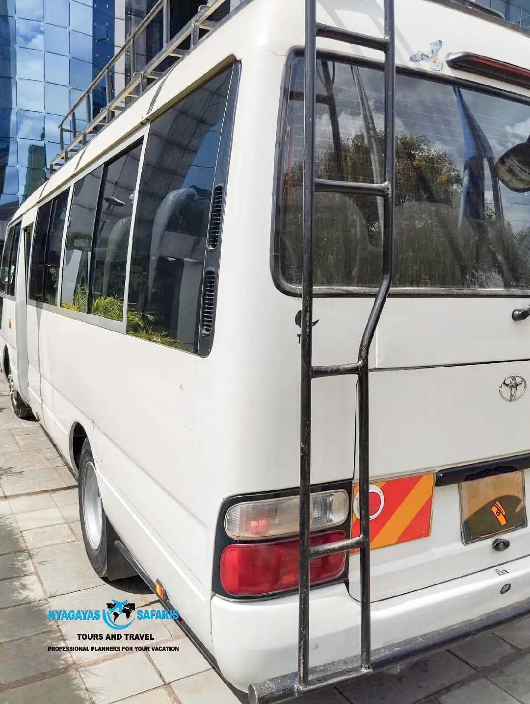 Toyota Coaster — Tour Bus